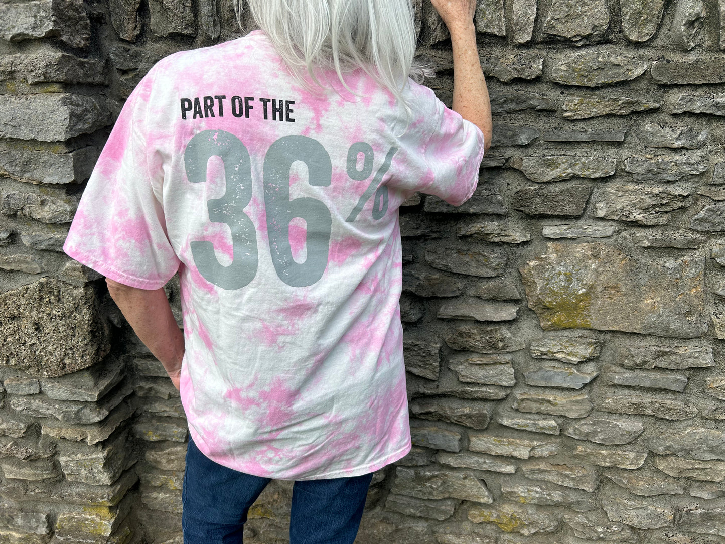 36% Shirt by Pink Tractor, pink tie-dye unisex tee supporting women in agriculture.